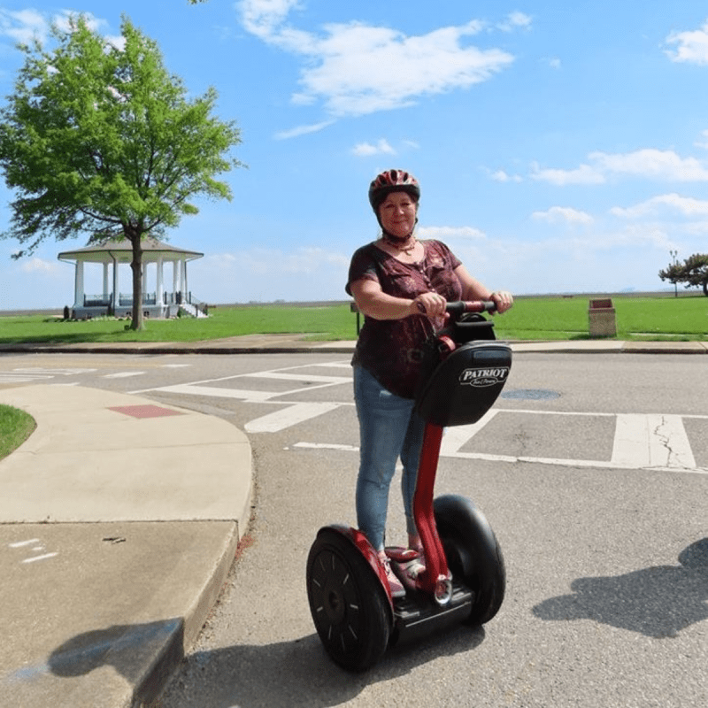 Jill Dutton on a segway while traveling solo