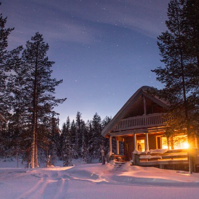 snowy cabin in the woods