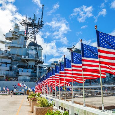 Flags in front of the USS Missouri Memorial in Honolulu, Hawaii