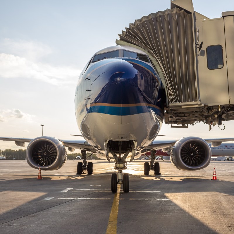 A Boeing 737 plane at an airport.