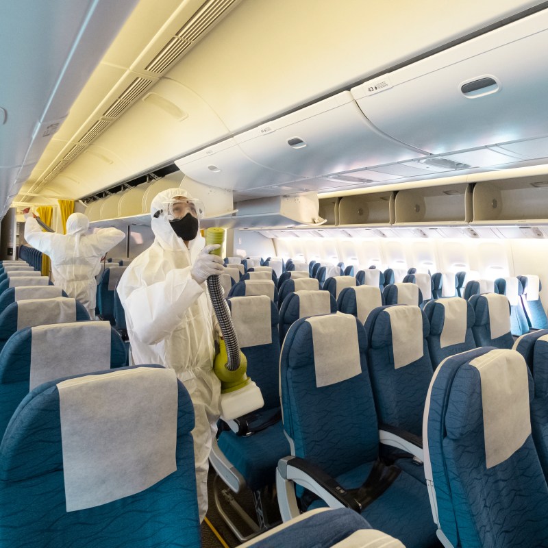 A deep cleaning crew on a passenger airplane.