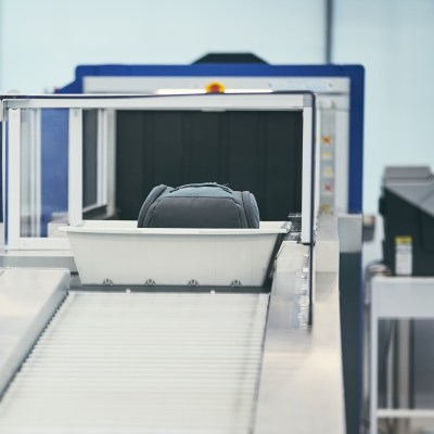 A luggage scanner at an airport.