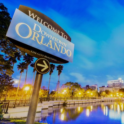 A sign pointing to downtown Orlando, Florida.