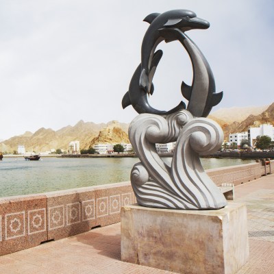 A statue of dolphins in Muscat, Oman.