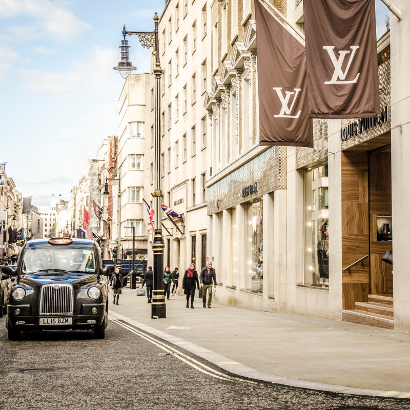 A street full of shops in London.