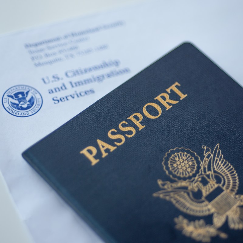 A U.S. passport and renewal form.