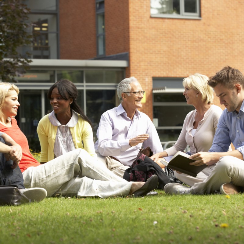 Adults learning outside.