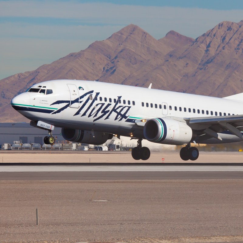 An Alaskan Airlines plane on the runway.