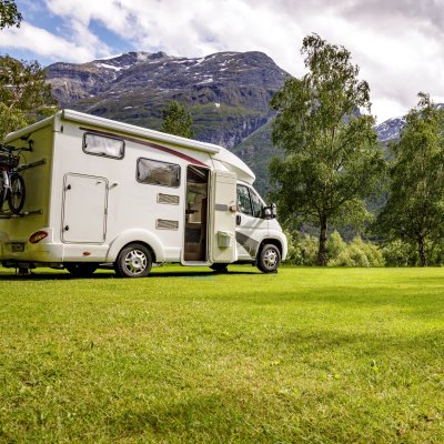 An RV camping trip in the mountains.