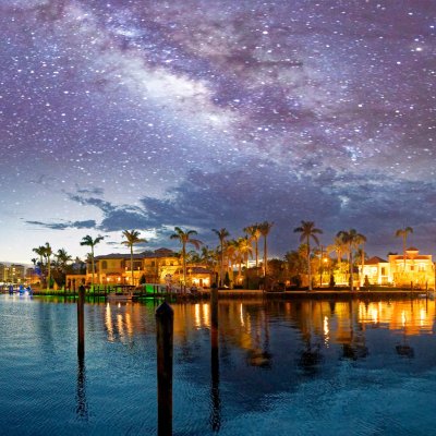 Boca Raton, Florida, with a starry sky above.