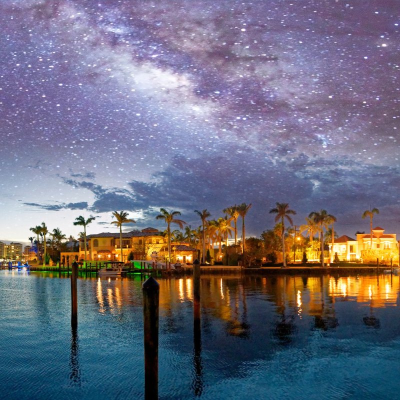 Boca Raton, Florida, with a starry sky above.