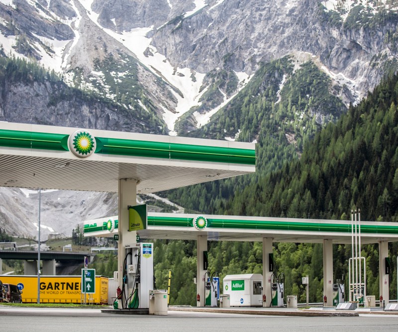 BP gas station in front of mountains