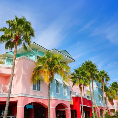 Colorful houses and palm trees in Fort Myers, Florida.