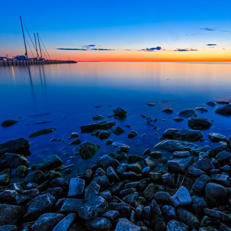 A glowing sunset sky illuminates the marina at Sister Bay in Door County, Wisconsin.