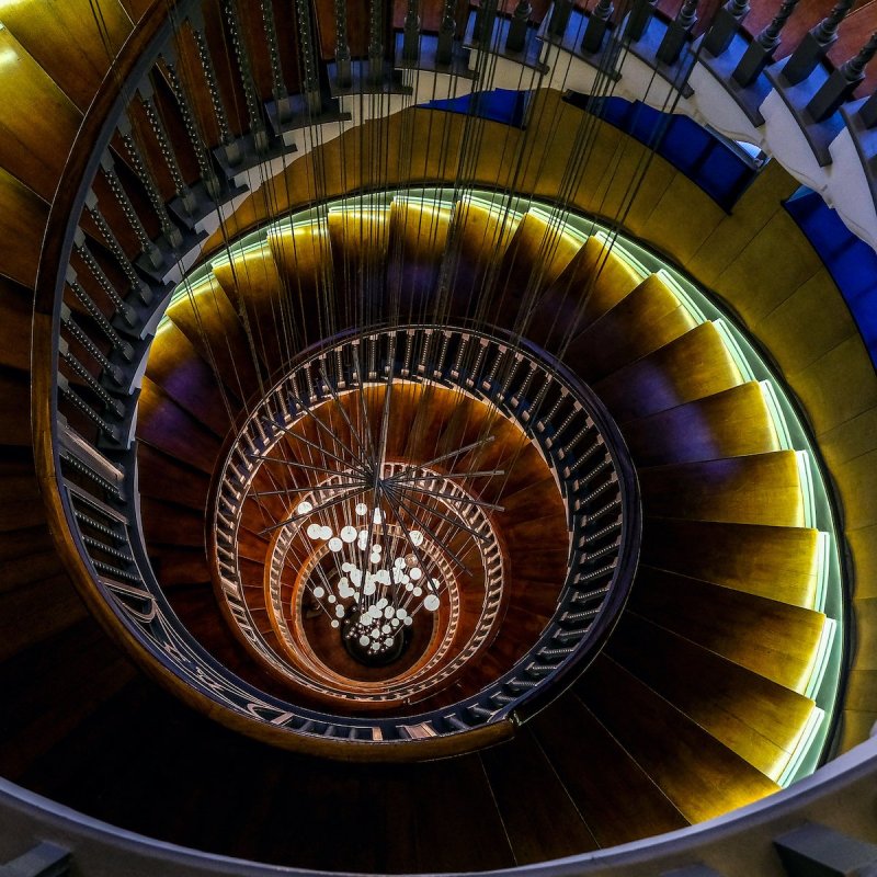 Lit staircase in Heal’s Furniture Store in London.