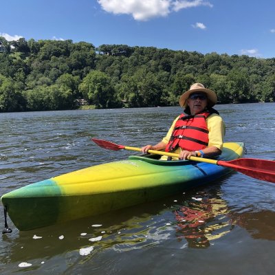 Mature man kayaking.