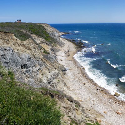 Mohegan Bluffs on Block Island, with the Southeast Light in the distance.