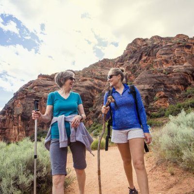mother and daughter hiking together