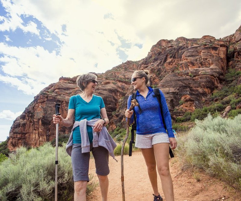 mother and daughter hiking together