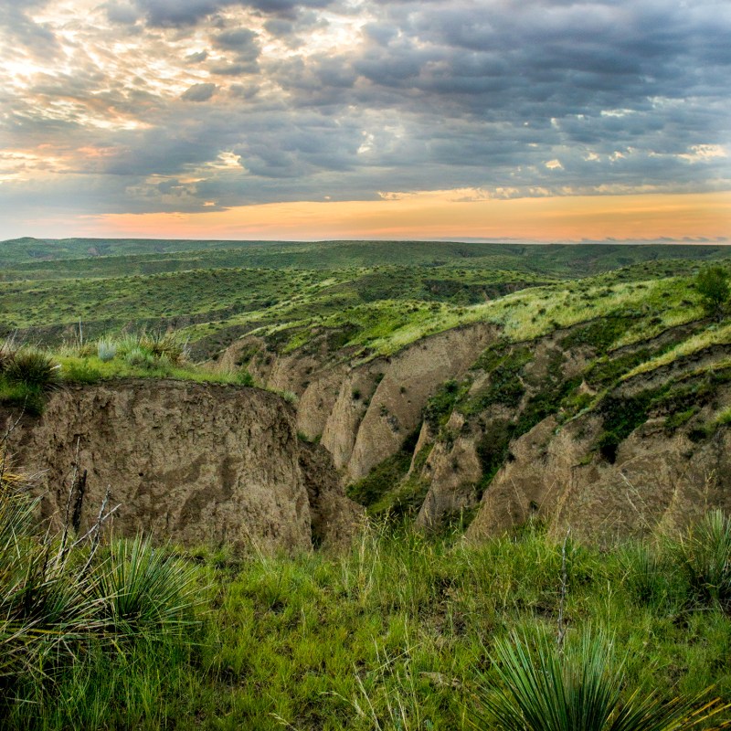 Orange sunrise over the Arikaree Breaks in Kansas.