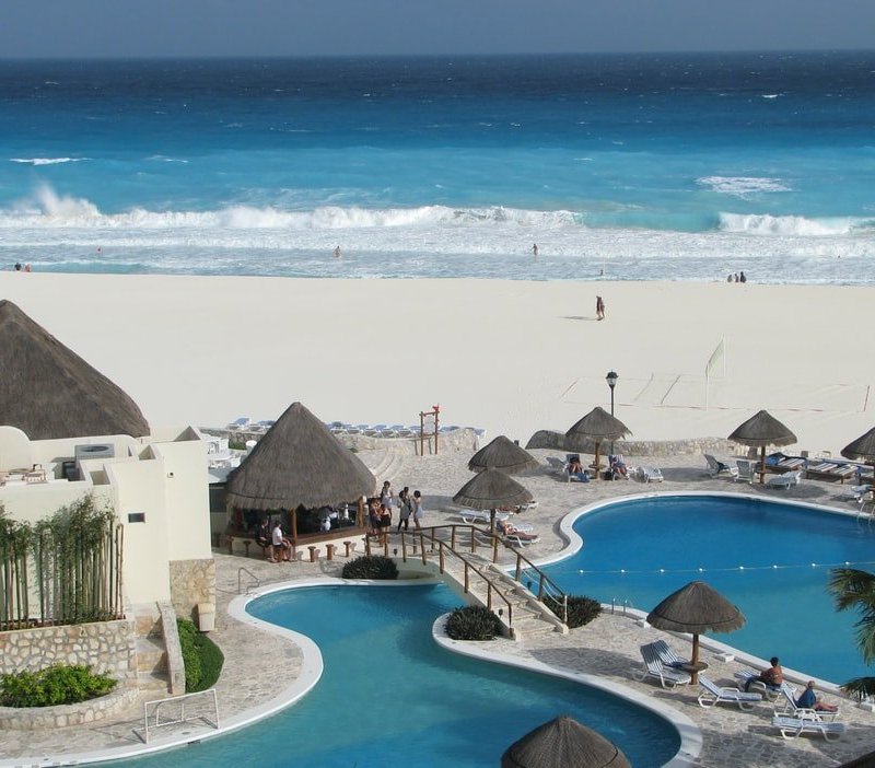 Resort beachline and pool in Cancun, Mexico