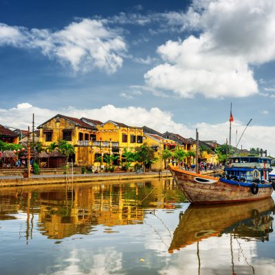 wooden boats in front of Hoi An in Vietnam