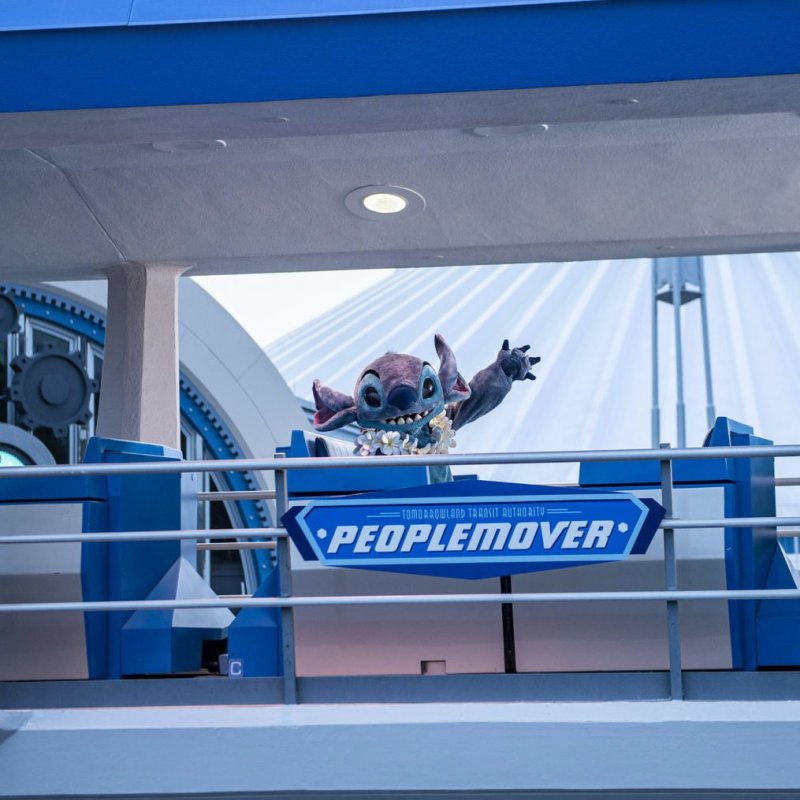 Stitch aboard Tomorrowland Transit Authority PeopleMover.