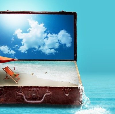 suitcase with beach scene