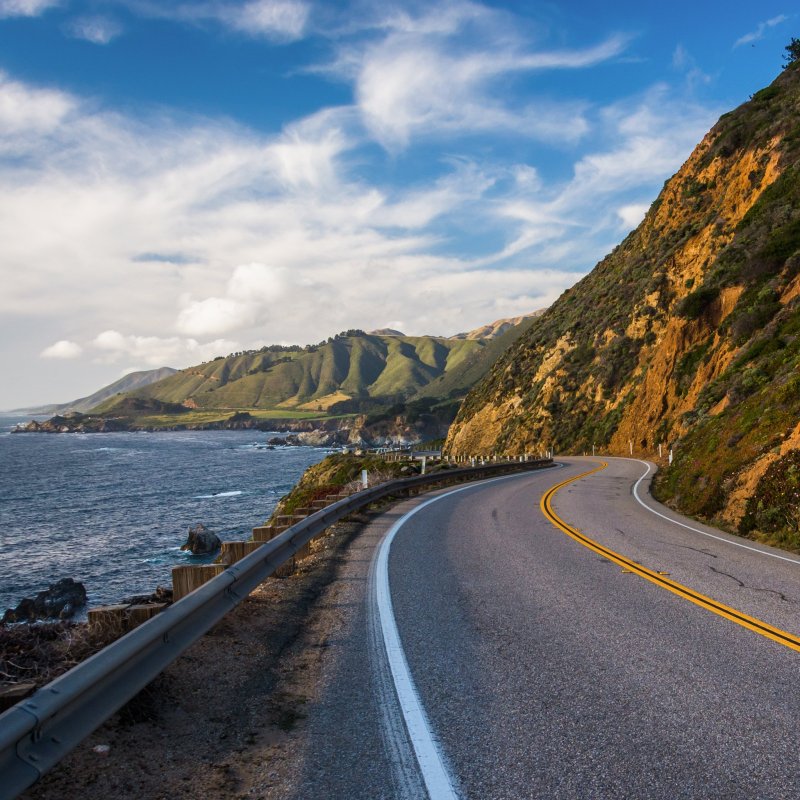 The iconic California State Route 1 along the Pacific Coast.