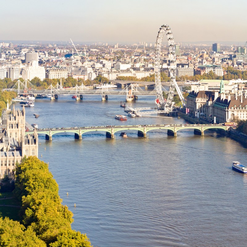 The London Eye along the banks of the River Thames.