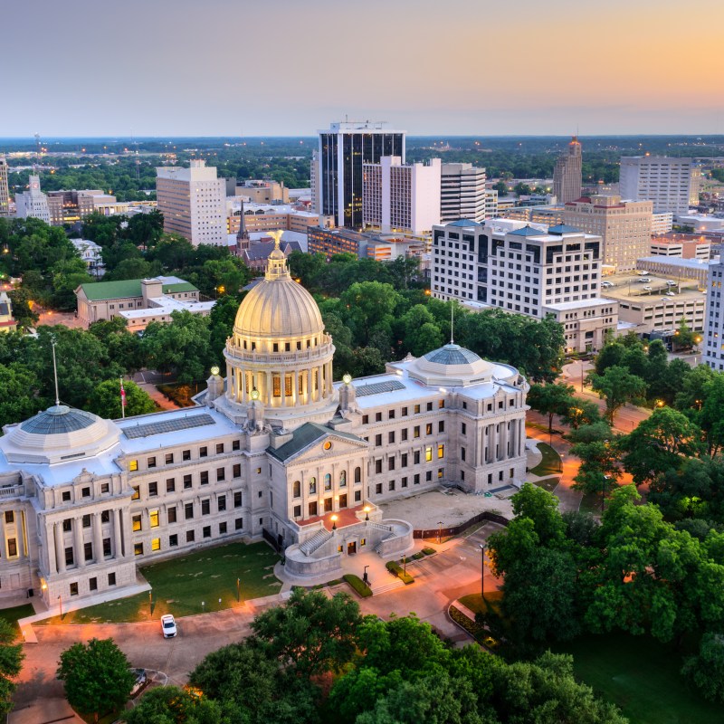 The Mississippi State Capitol building and the Jackson skyline.