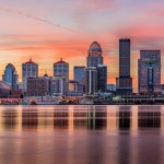 The skyline of Louisville, Kentucky, at sunset.