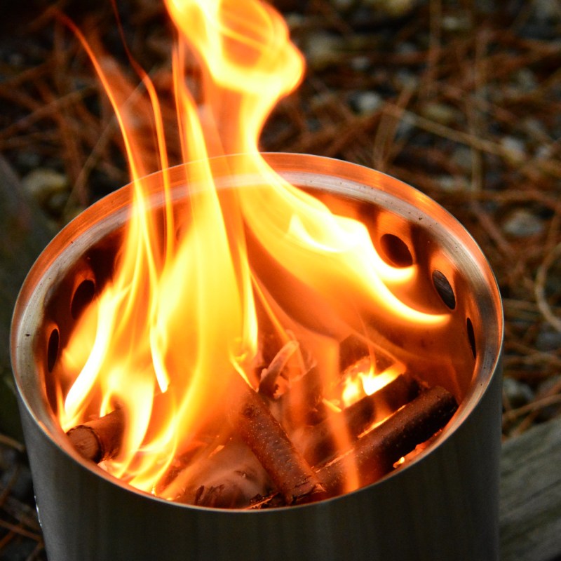 The Solo Stove burning wood.