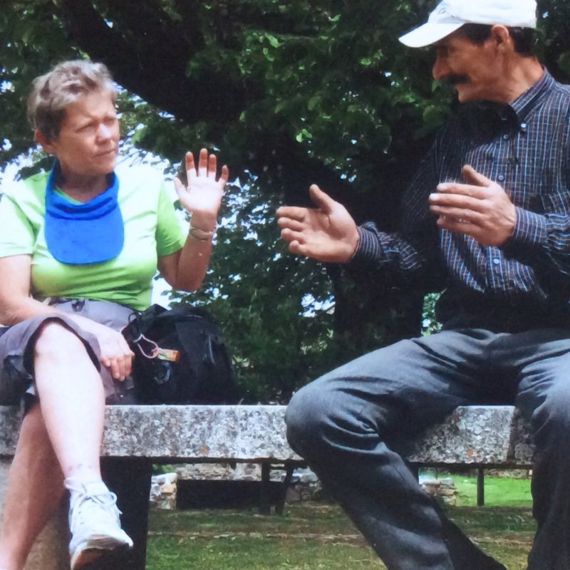 The writer having a conversation with a Portuguese man on a trip.