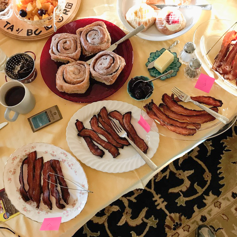 The writers creating their own bacon tasting at home.