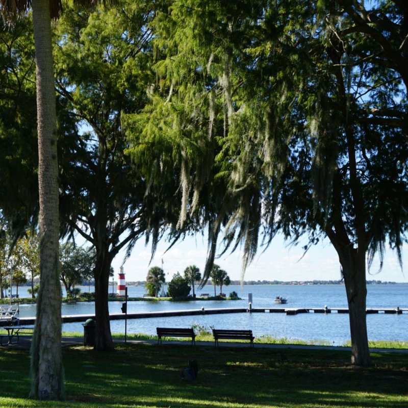 Views of the Mount Dora Lighthouse and Lake Dora in Florida.