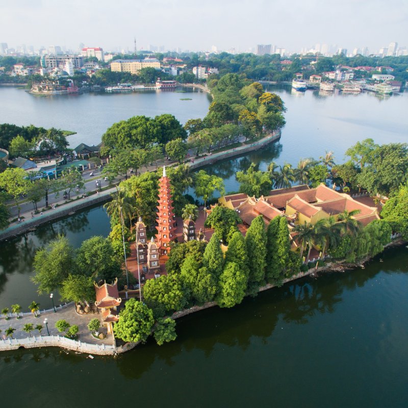 Views of the Tran Quoc Pogoda and the skyline of Hanoi, Vietnam.