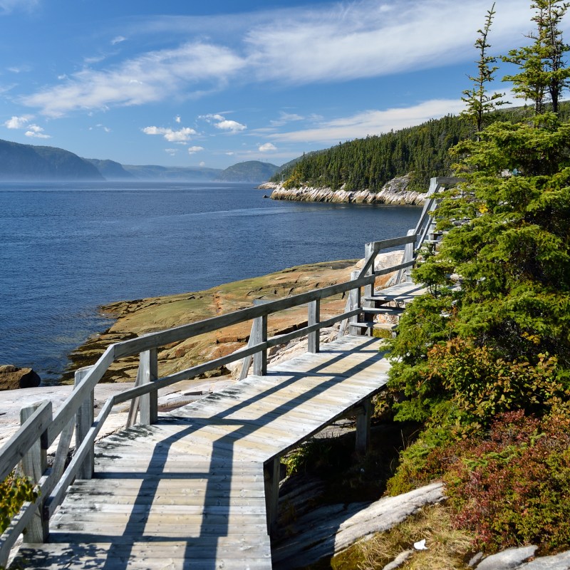 Wooden pathway in Sainte-Marguerite bay, Quebec.