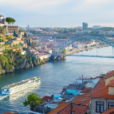 Cruise ship arrives to Porto by the river Douro. Portugal