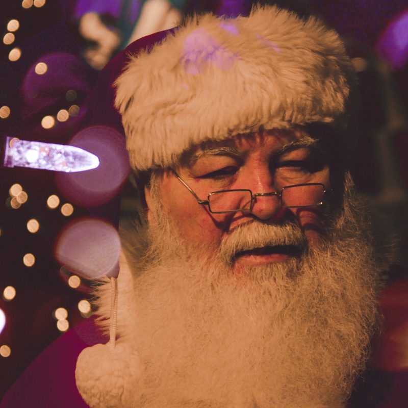 bokeh photography of Santa Claus