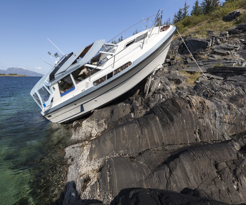 boat after collision with boulders in Norway