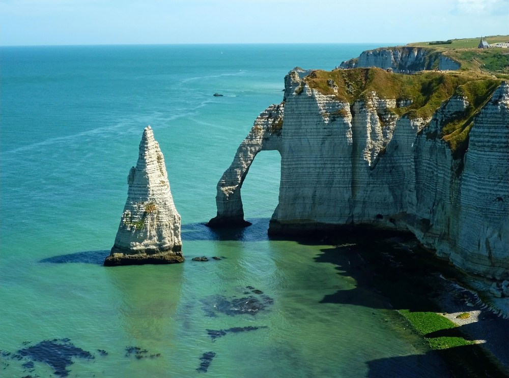 Visit Étretat's Striking White Chalk Cliffs and Magnificent Rock Arch ...