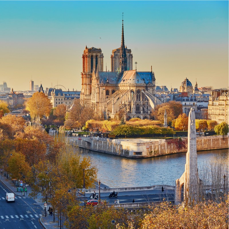 Paris, France, with the Notre-Dame Cathedral's prominent spire reaching high above.
