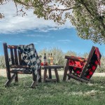 Two rocking chairs sit outside at the Apple Jack Festival