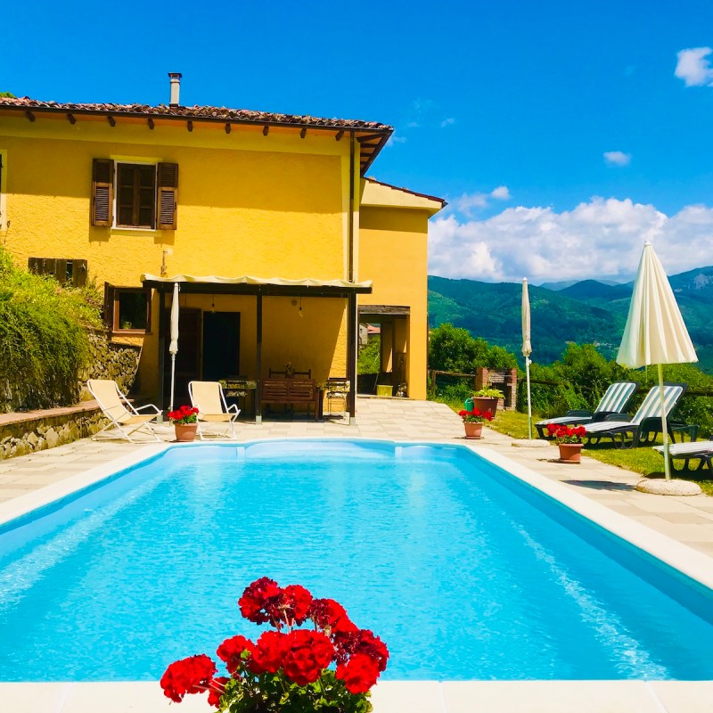 House and pool view of $470,000 Tuscany villa being raffled off in January.