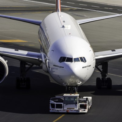 Passenger airliner being towed.