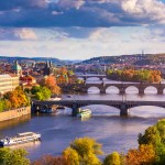Autumn view to Charles bridge on Vltava river in Prague, Czech Republic.