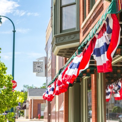 Patriotic bunting on a business in a small town, shallow depth