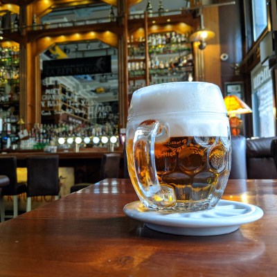 A mug of beer in a bar in Prague, Czech Republic