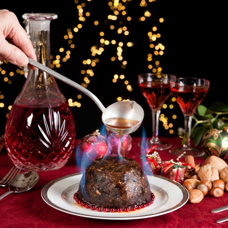Plum pudding, a traditional Irish Christmas meal, set alight.